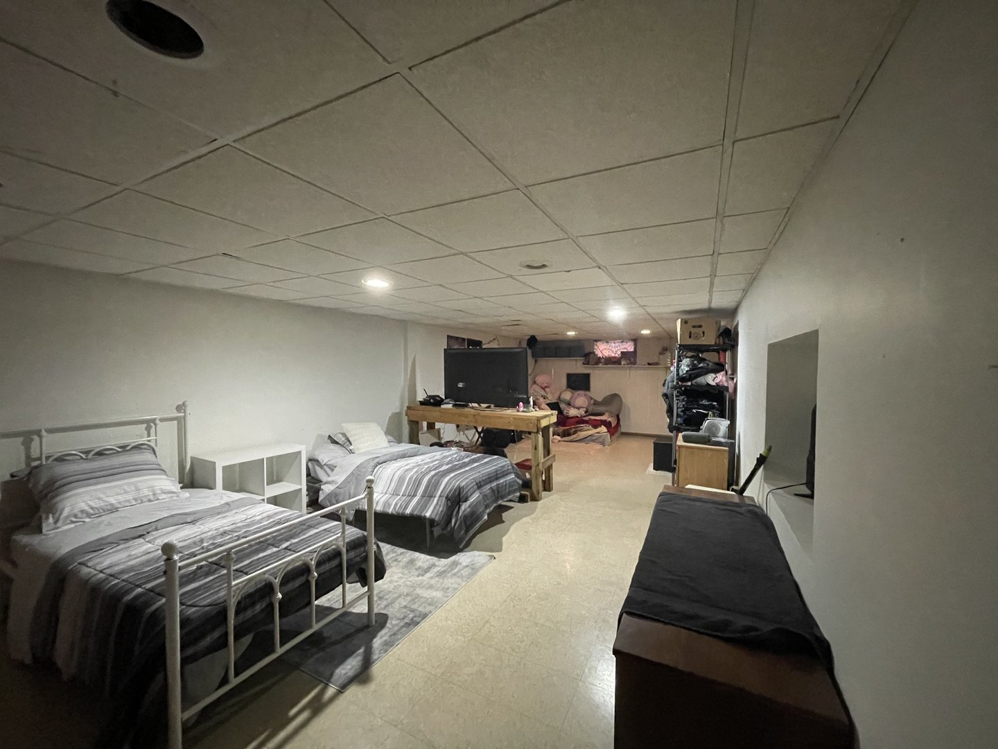 1949 Will James Road Rockford, IL 61109 - Photo 15 of 17 a bed room with two bed and a ceiling fan
