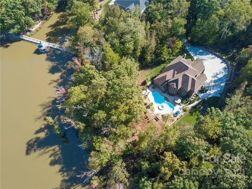 2130 Pondmeade Lane Matthews, NC 28104 - Photo 12 of 47 a view of a house with a yard