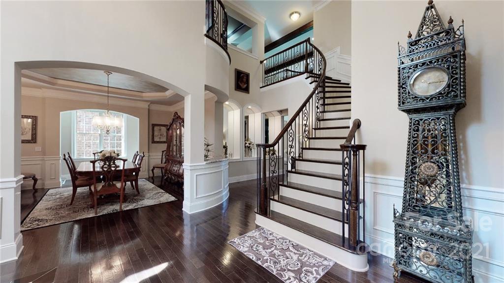 2130 Pondmeade Lane Matthews, NC 28104 - Photo 15 of 47 a view of entryway and hall with wooden floor