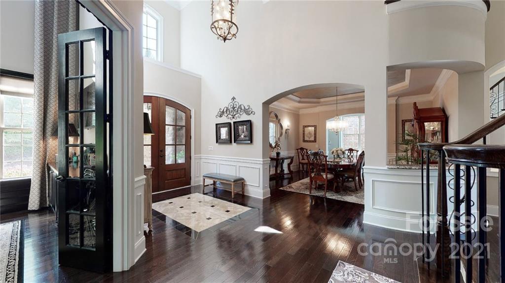 2130 Pondmeade Lane Matthews, NC 28104 - Photo 16 of 47 a living room with lots of furniture and a wooden floor