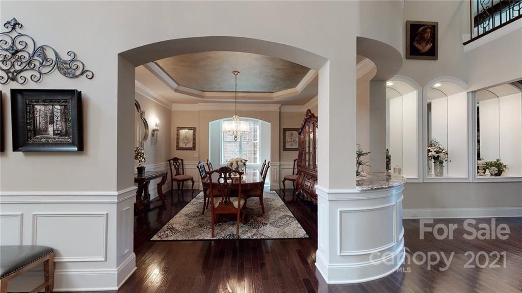 2130 Pondmeade Lane Matthews, NC 28104 - Photo 23 of 47 a view of living room and kitchen