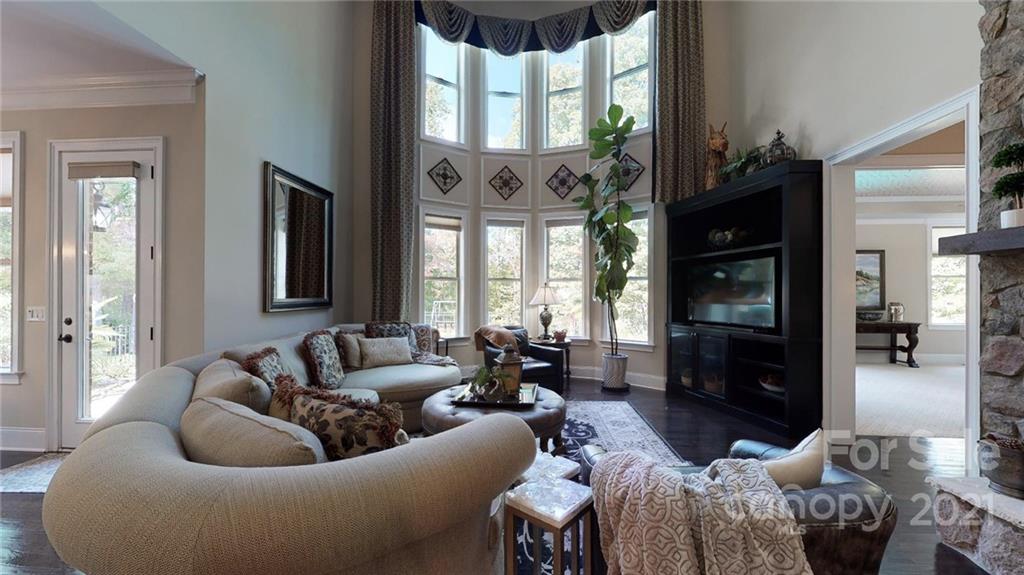 2130 Pondmeade Lane Matthews, NC 28104 - Photo 34 of 47 a living room with furniture and a large window