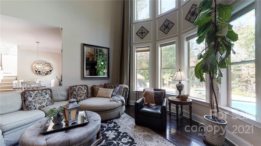 2130 Pondmeade Lane Matthews, NC 28104 - Photo 36 of 47 a living room with furniture and a large window