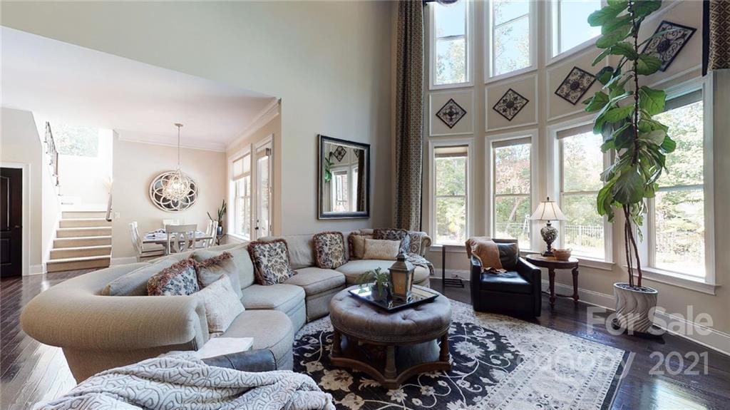 2130 Pondmeade Lane Matthews, NC 28104 - Photo 37 of 47 a living room with furniture and a large window