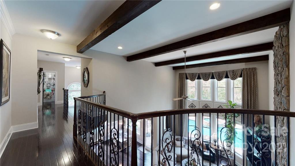 2130 Pondmeade Lane Matthews, NC 28104 - Photo 41 of 47 a view of staircase with wooden floor and stairs