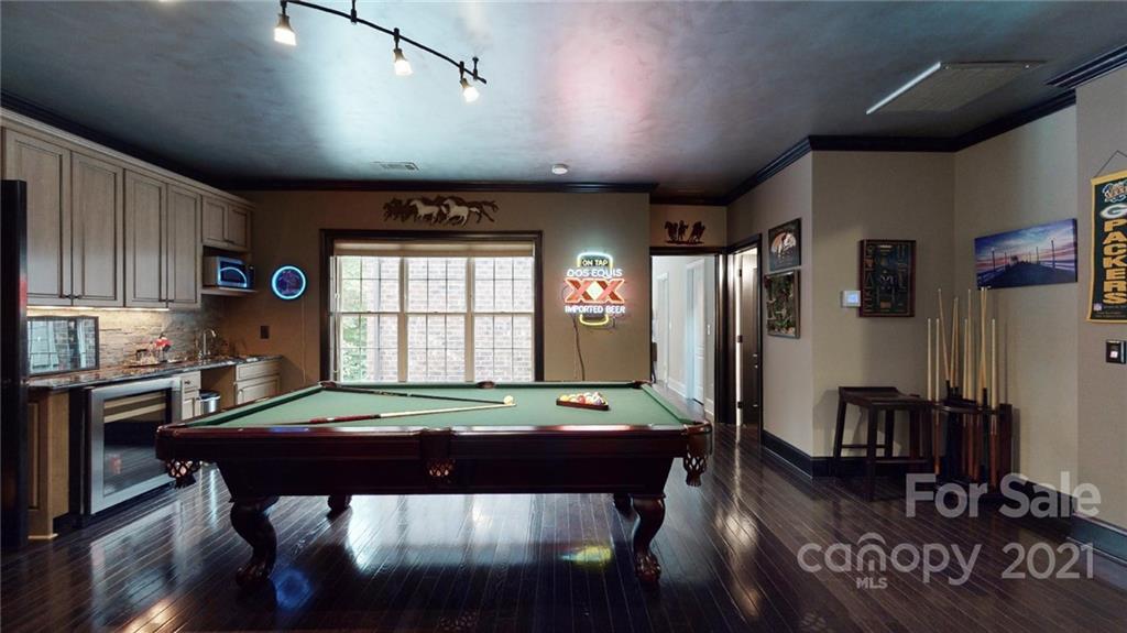 2130 Pondmeade Lane Matthews, NC 28104 - Photo 43 of 47 a view of a dining room with furniture window and wooden floor