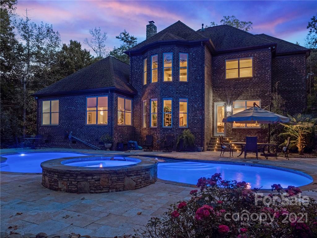 2130 Pondmeade Lane Matthews, NC 28104 - Photo 7 of 47 a view of a house with a patio