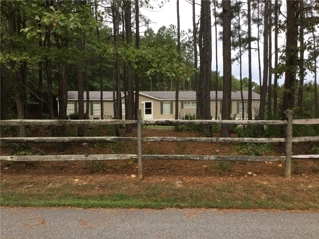 136 Madden Road Kingston, GA 30145 - Photo 1 of 1 a view of outdoor space with deck