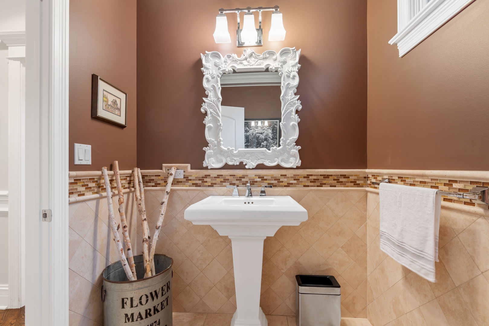 Undisclosed Address Wilmette, IL 60091 - Photo 20 of 57 a bathroom with a sink and a mirror