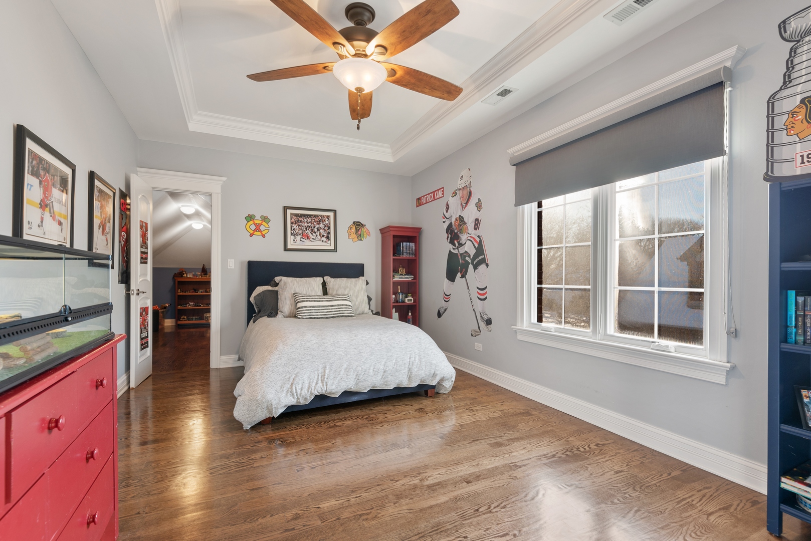 Undisclosed Address Wilmette, IL 60091 - Photo 28 of 57 a spacious bedroom with a bed chandelier and a window