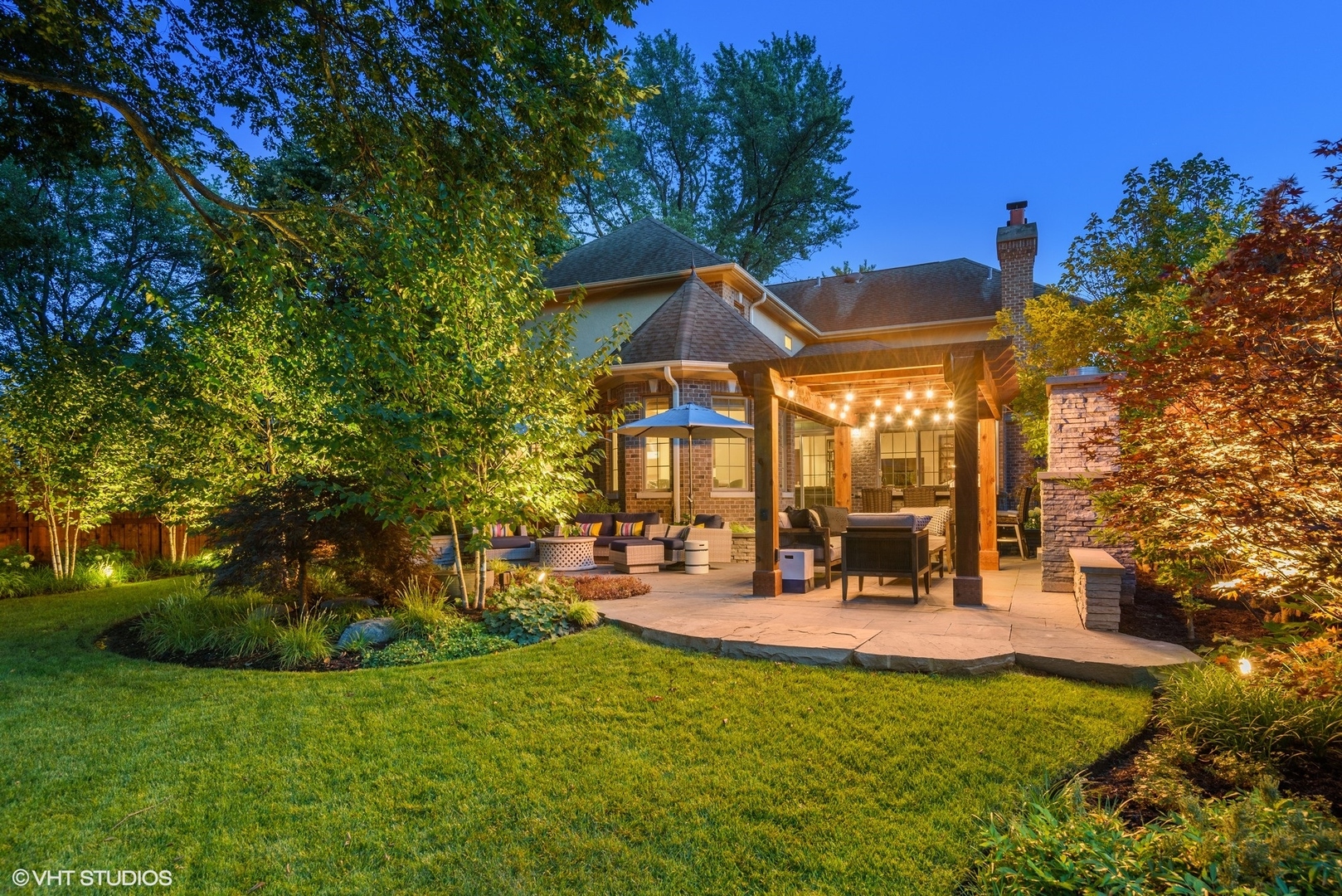 Undisclosed Address Wilmette, IL 60091 - Photo 3 of 57 a view of a house with backyard porch and sitting area