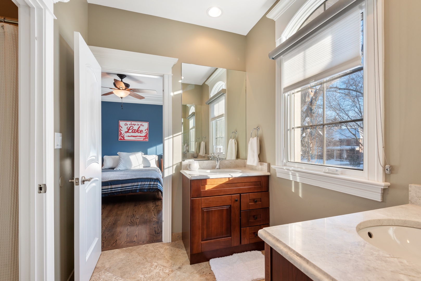 Undisclosed Address Wilmette, IL 60091 - Photo 31 of 57 a kitchen with a sink and a stove next to a window