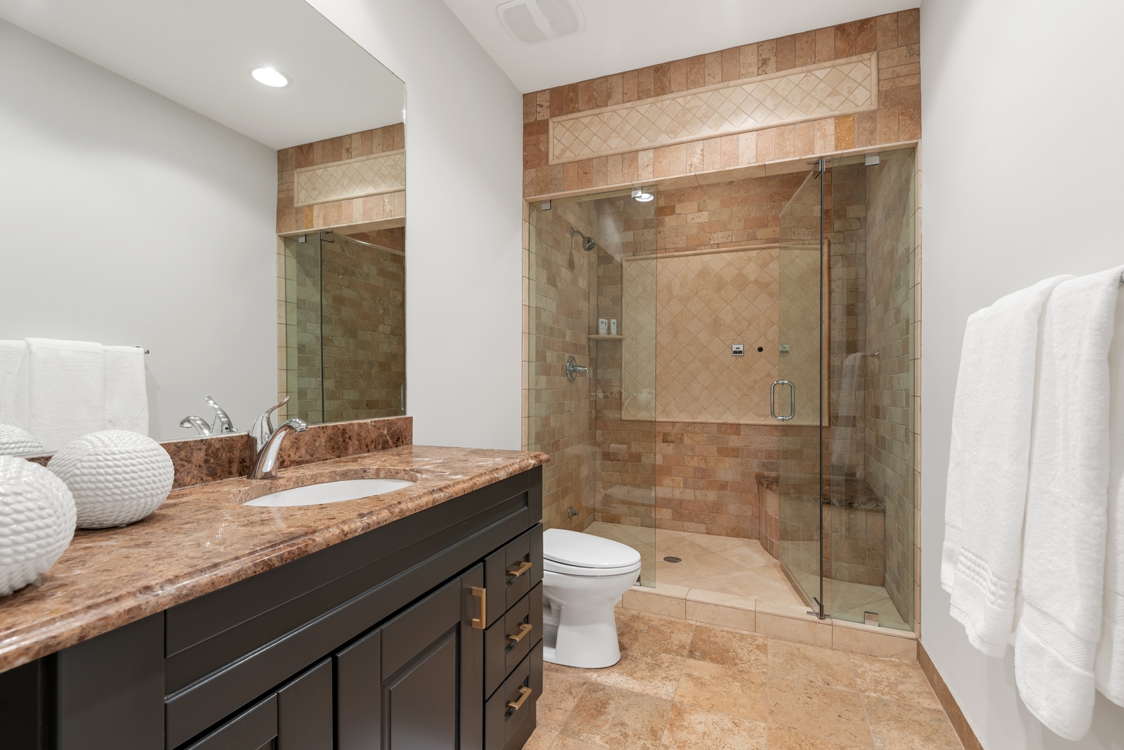 Undisclosed Address Wilmette, IL 60091 - Photo 34 of 57 a bathroom with a granite countertop sink toilet and shower