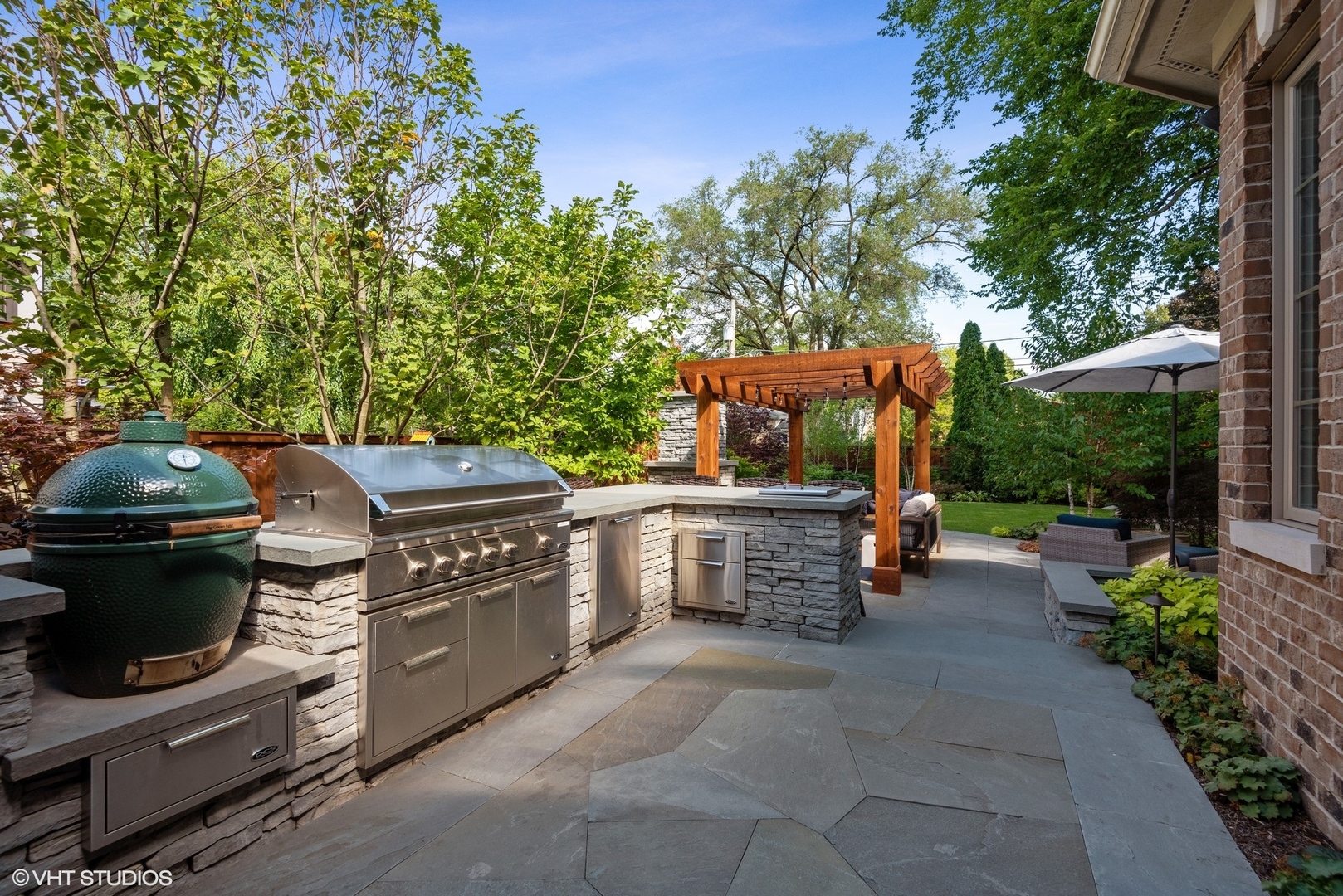 Undisclosed Address Wilmette, IL 60091 - Photo 51 of 57 a view of a patio with chairs and a stove