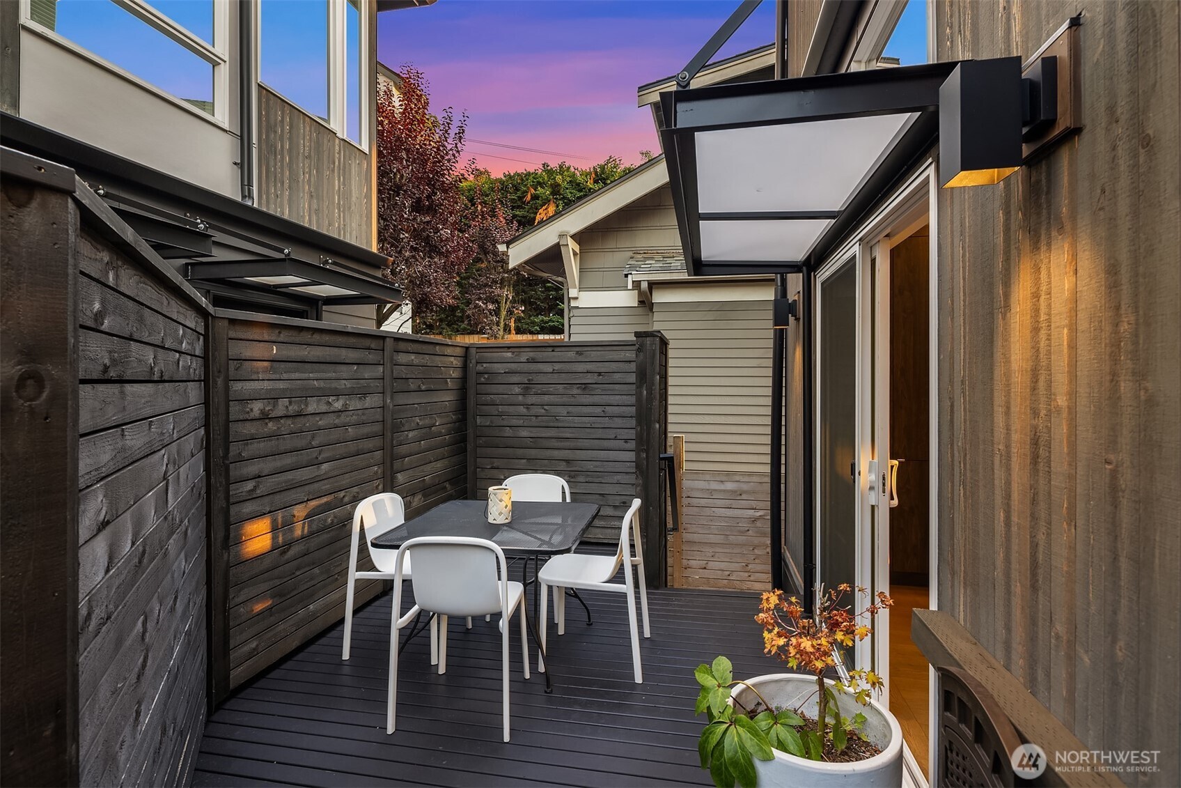1910 8th Avenue West, Unit B Seattle, WA 98119 - Photo 12 of 40 a view of a chairs and table in the balcony