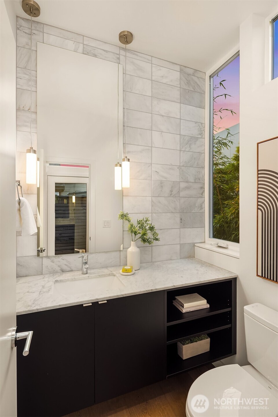 1910 8th Avenue West, Unit B Seattle, WA 98119 - Photo 14 of 40 a bathroom with a sink and a mirror