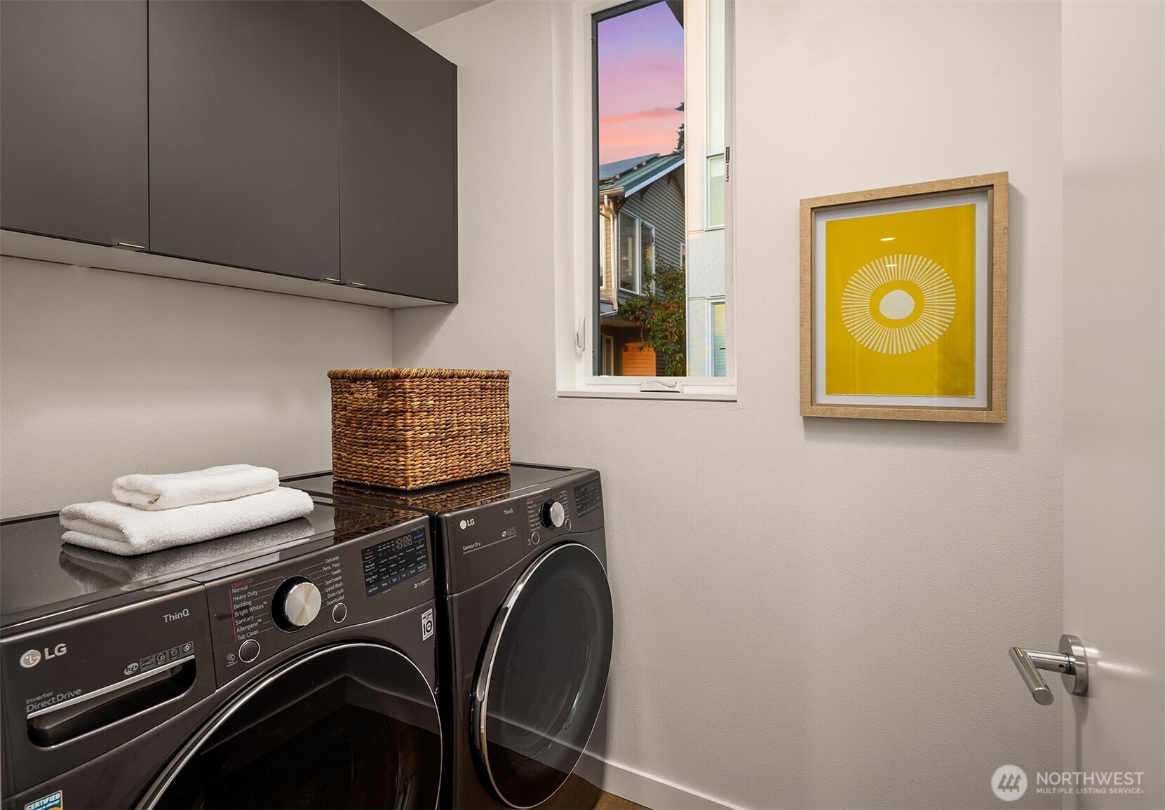 1910 8th Avenue West, Unit B Seattle, WA 98119 - Photo 25 of 40 a view of that has a washer and dryer