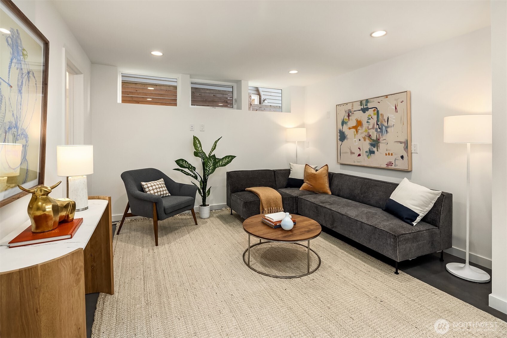 1910 8th Avenue West, Unit B Seattle, WA 98119 - Photo 26 of 40 a living room with furniture and wooden floor