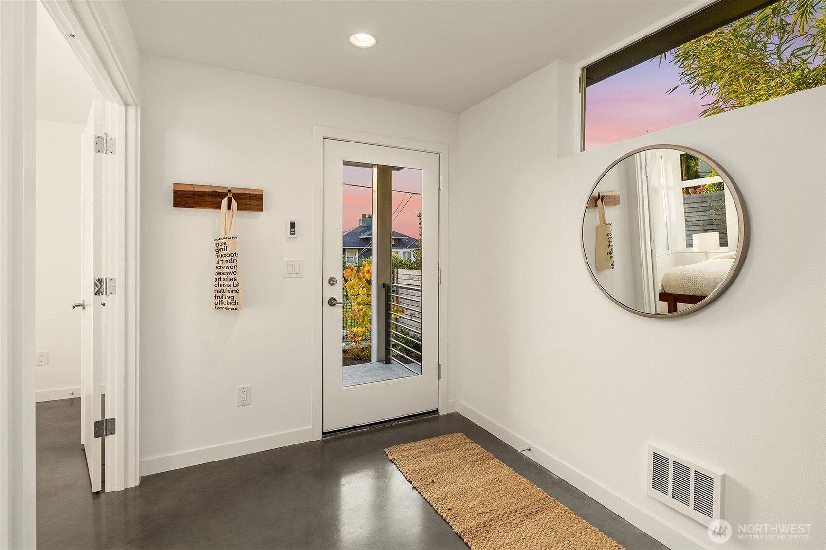 1910 8th Avenue West, Unit B Seattle, WA 98119 - Photo 32 of 40 a view of a livingroom with wooden floor