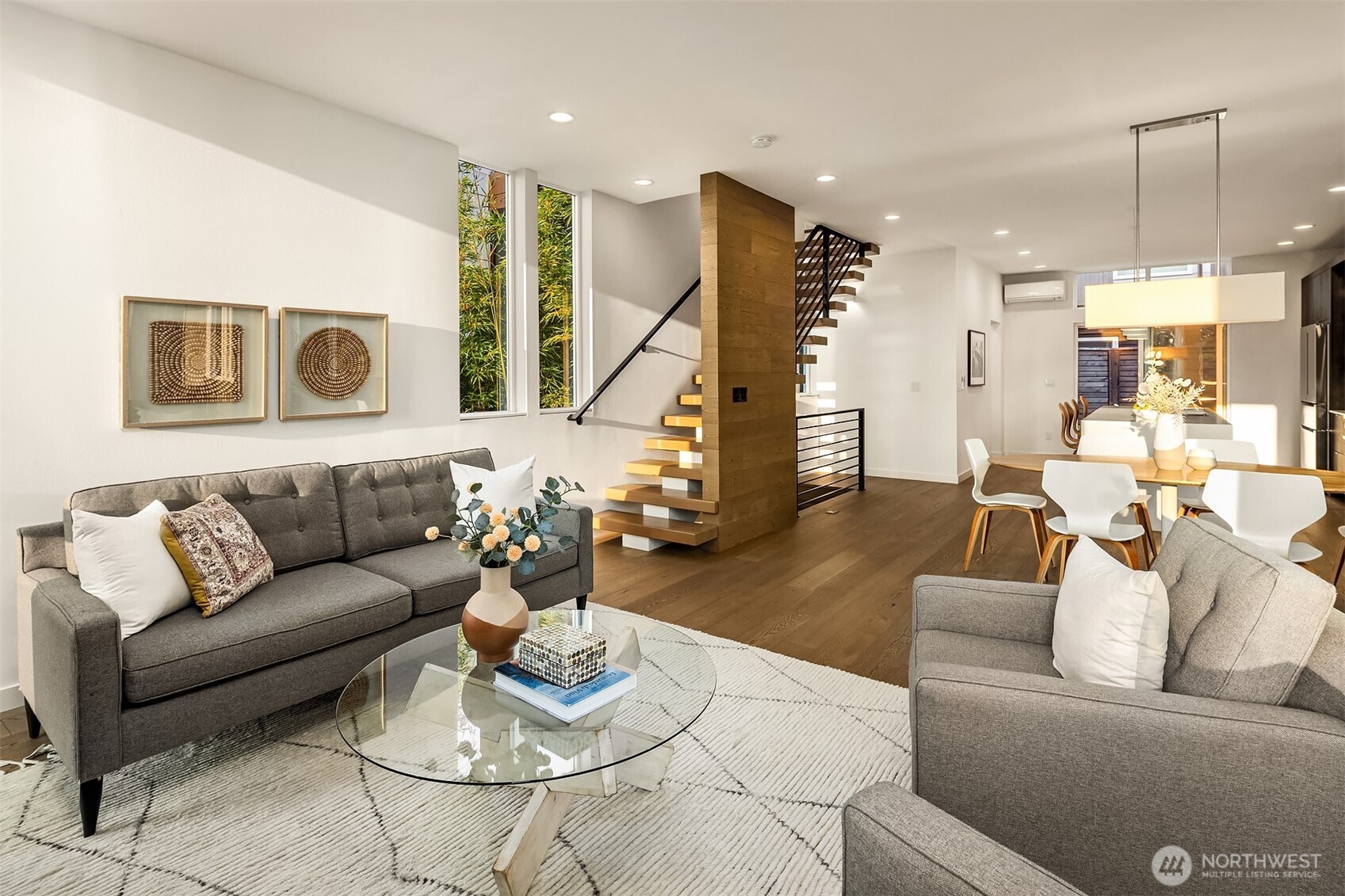 1910 8th Avenue West, Unit B Seattle, WA 98119 - Photo 7 of 40 a living room with furniture and wooden floor