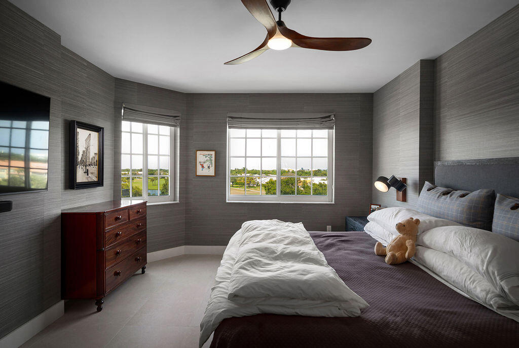 17031 Boca Club Boulevard, Unit 65A Boca Raton, FL 33487 - Photo 12 of 34 a living room with furniture and a window