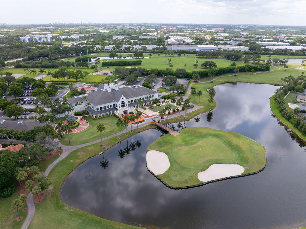 17031 Boca Club Boulevard, Unit 65A Boca Raton, FL 33487 - Photo 2 of 34 an aerial view of a swimming pool