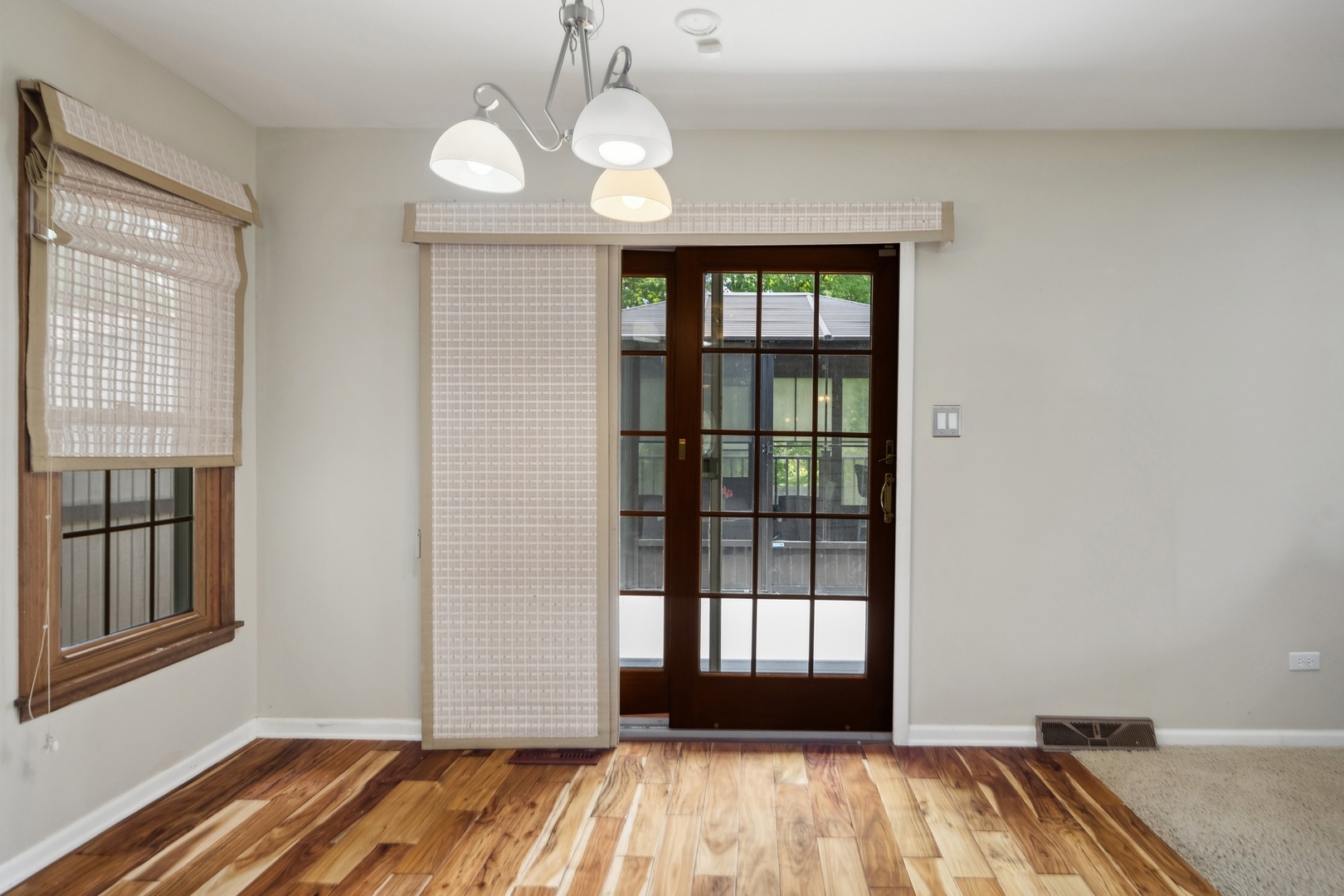 15216 South Clover Court Plainfield, IL 60544 - Photo 12 of 35 a view of a bedroom with wooden floor and windows