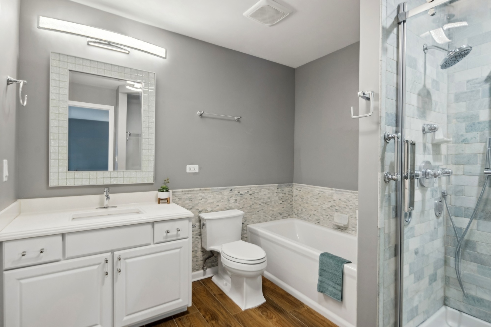 15216 South Clover Court Plainfield, IL 60544 - Photo 16 of 35 a bathroom with a sink a toilet and shower