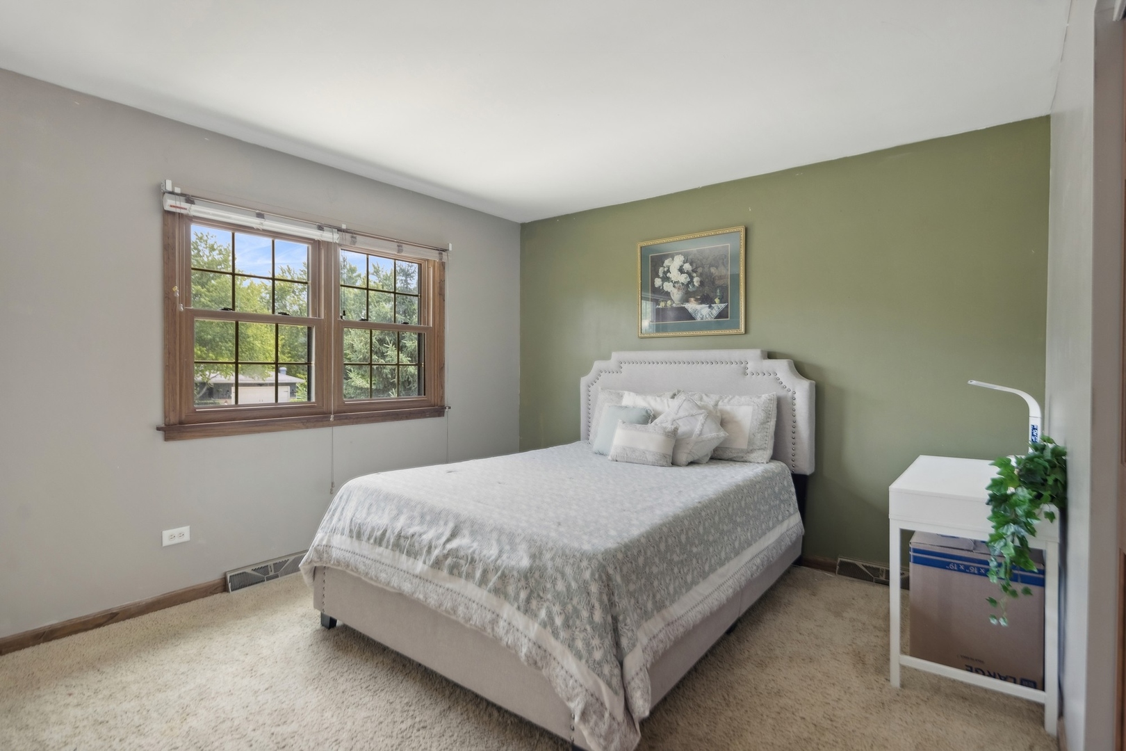 15216 South Clover Court Plainfield, IL 60544 - Photo 18 of 35 a bedroom with a bed lamp and a window