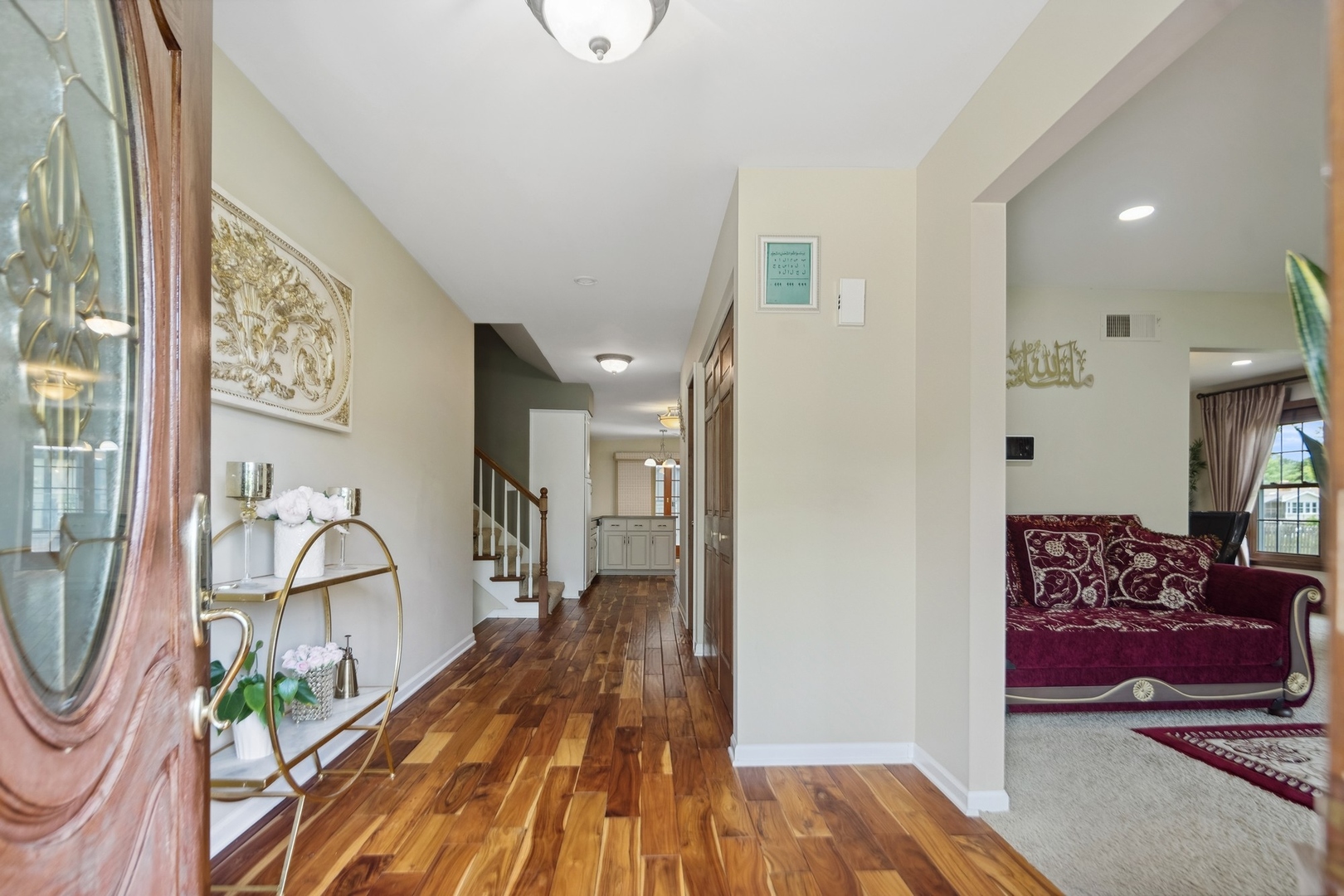 15216 South Clover Court Plainfield, IL 60544 - Photo 2 of 35 a view of an entryway with wooden floor