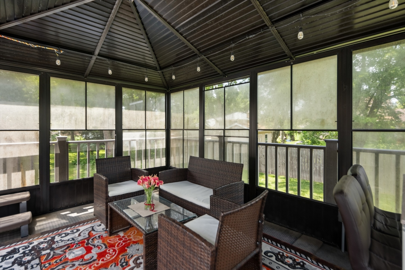 15216 South Clover Court Plainfield, IL 60544 - Photo 30 of 35 a living room with furniture a wooden floor and a large window