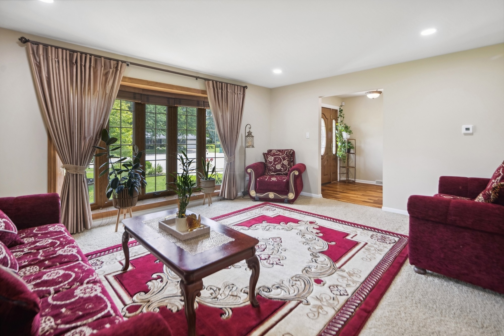 15216 South Clover Court Plainfield, IL 60544 - Photo 4 of 35 a living room with furniture and a rug