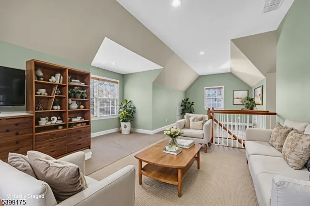 an entryway with ceiling fan