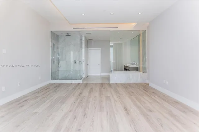 a view of a front door and bedroom