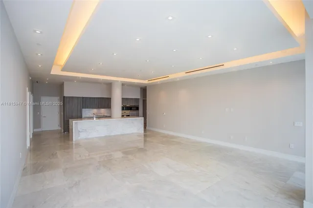 a view of a hallway with a couch