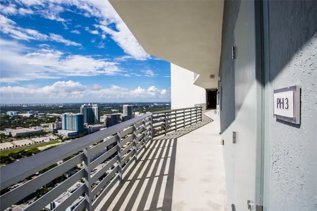 a view of a balcony with city view