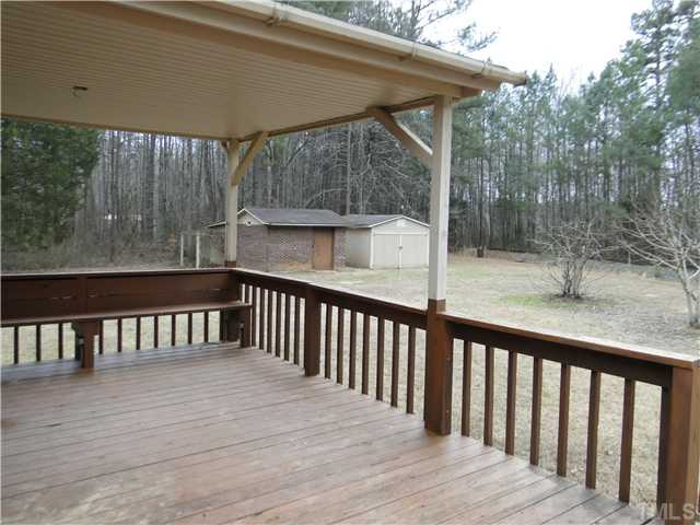 10703 Quail Roost Road Bahama, NC 27503 - Photo 18 of 20 Covered and uncovered deck! Storage building convey!