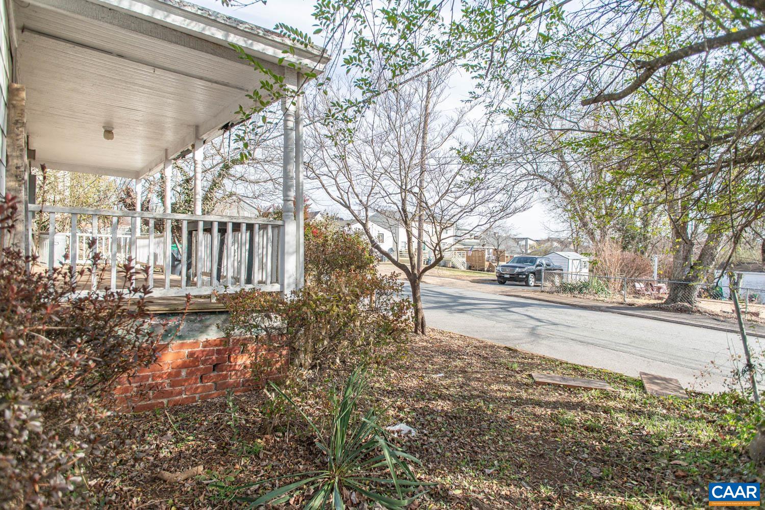 611 Rives Street Charlottesville, VA 22902 - Photo 16 of 18 a view of road with large trees