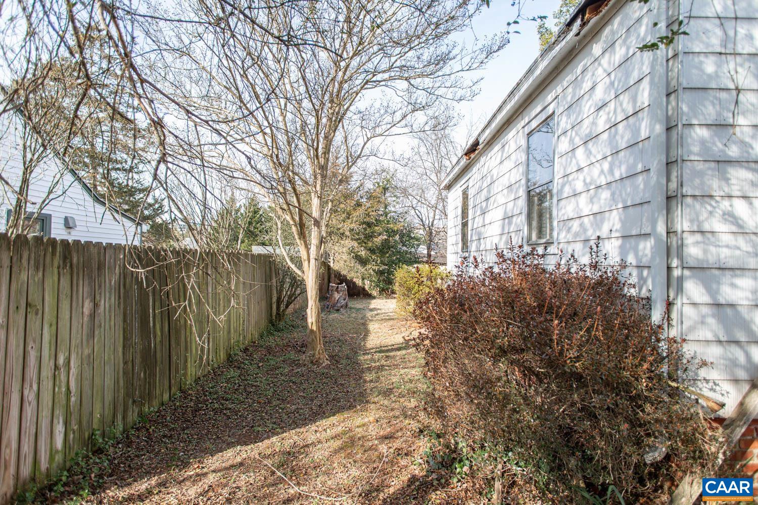 611 Rives Street Charlottesville, VA 22902 - Photo 17 of 18 a pathway of a house with a yard