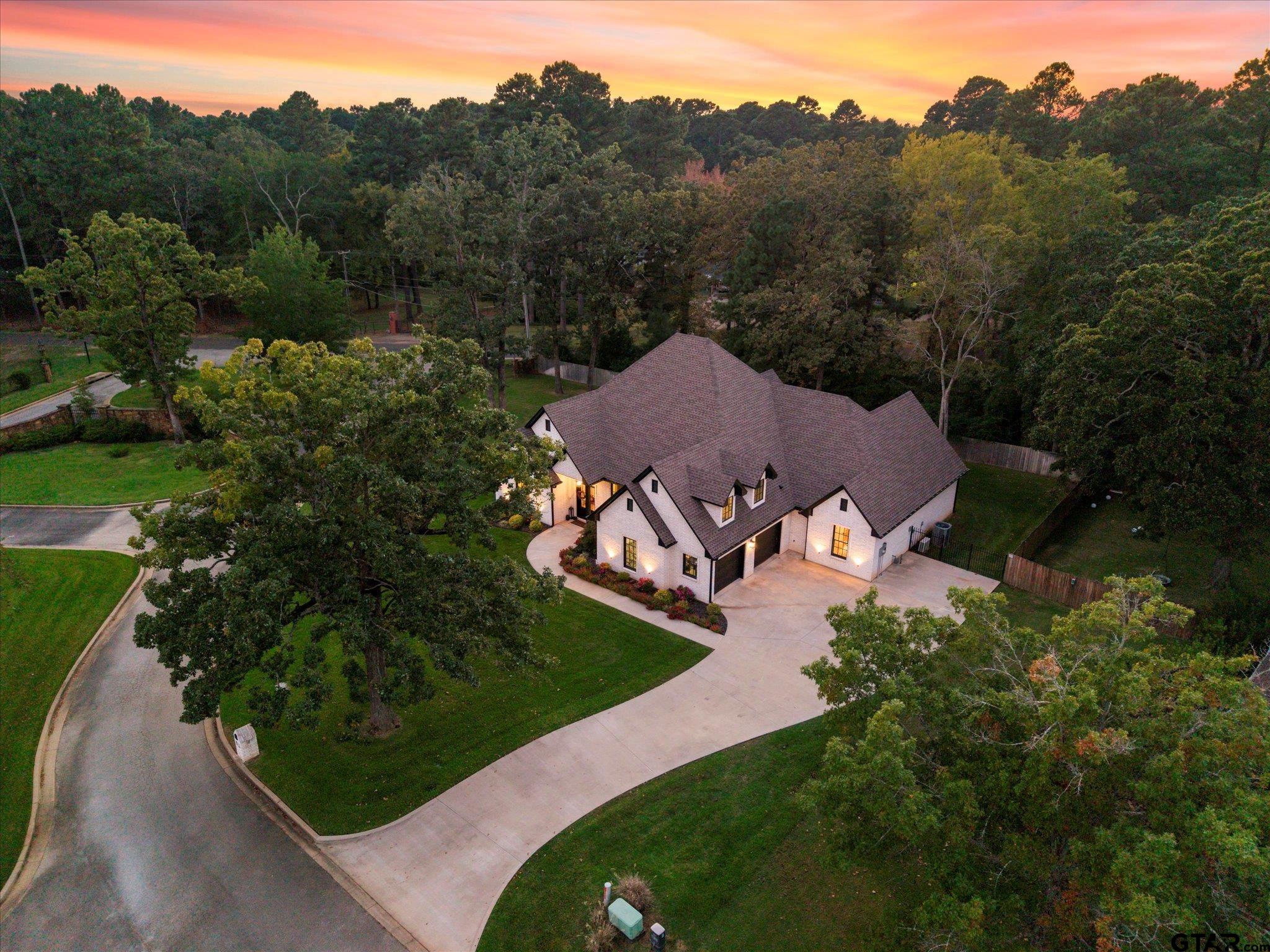 4301 Windrush Boulevard Longview, TX 75604 - Photo 31 of 36 an aerial view of a house