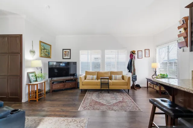 a view of a balcony with chairs
