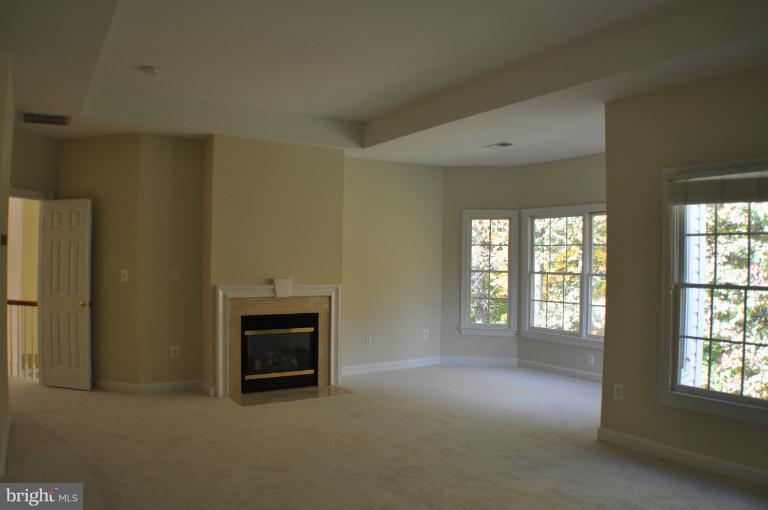 7420 Spring Summit Road Springfield, VA 22150 - Photo 27 of 30 Gas Fireplace and Sitting Area in MBR
