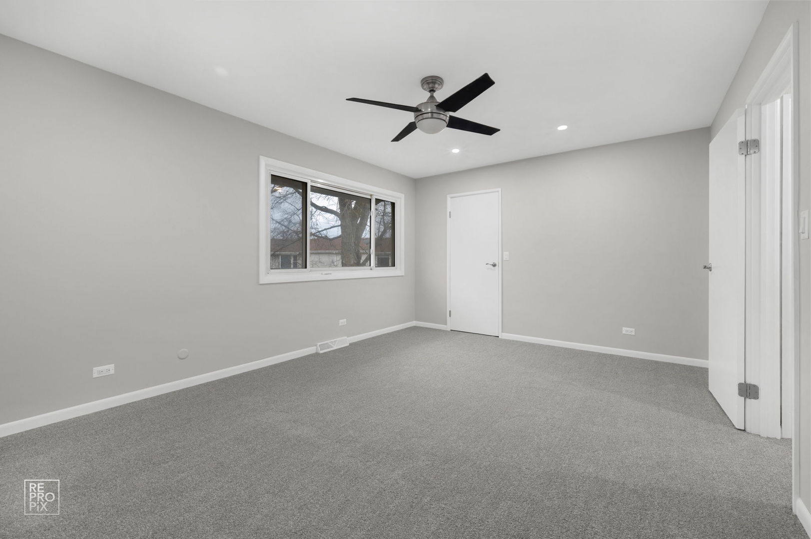 524 Jordan Way Bolingbrook, IL 60440 - Photo 11 of 16 a view of an empty room with a window