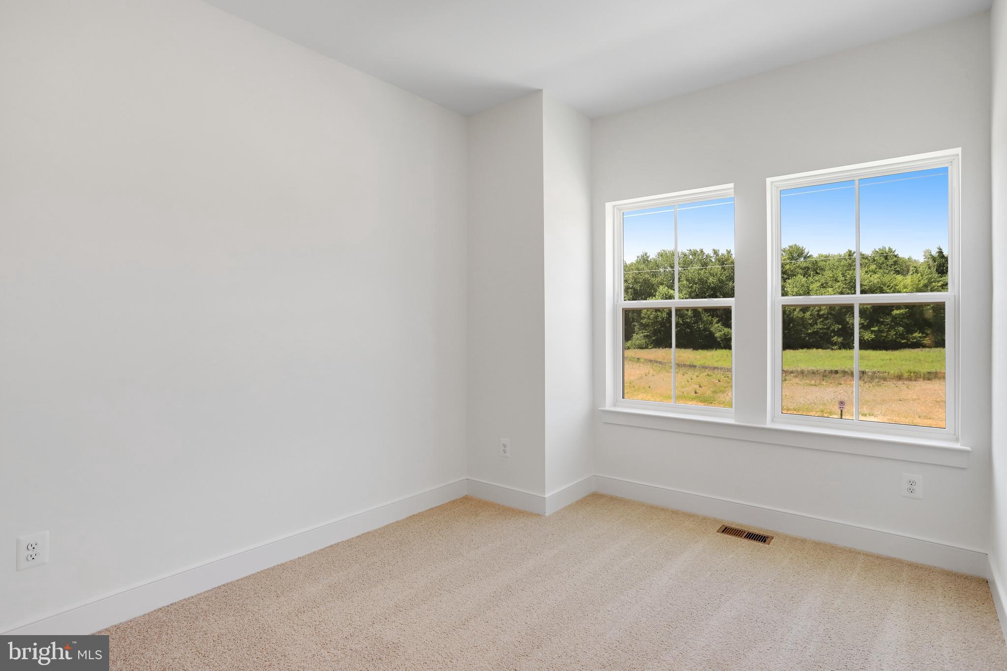752 Elevation Road Frederick, MD 21702 - Photo 26 of 35 an empty room with windows