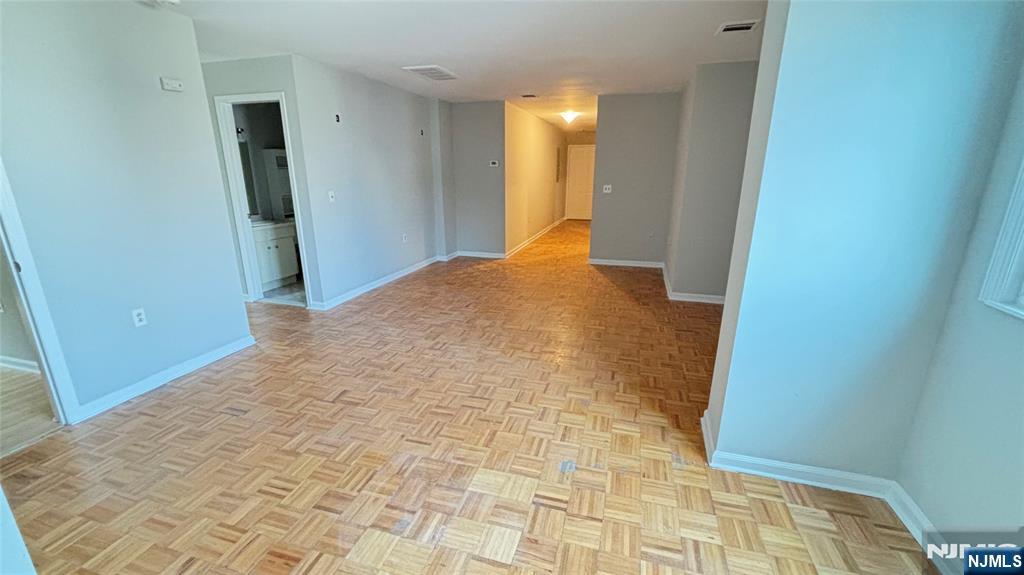 308-310 Passaic Avenue, Unit 201 Harrison, NJ 07029 - Photo 3 of 31 a view of hallway with wooden floor