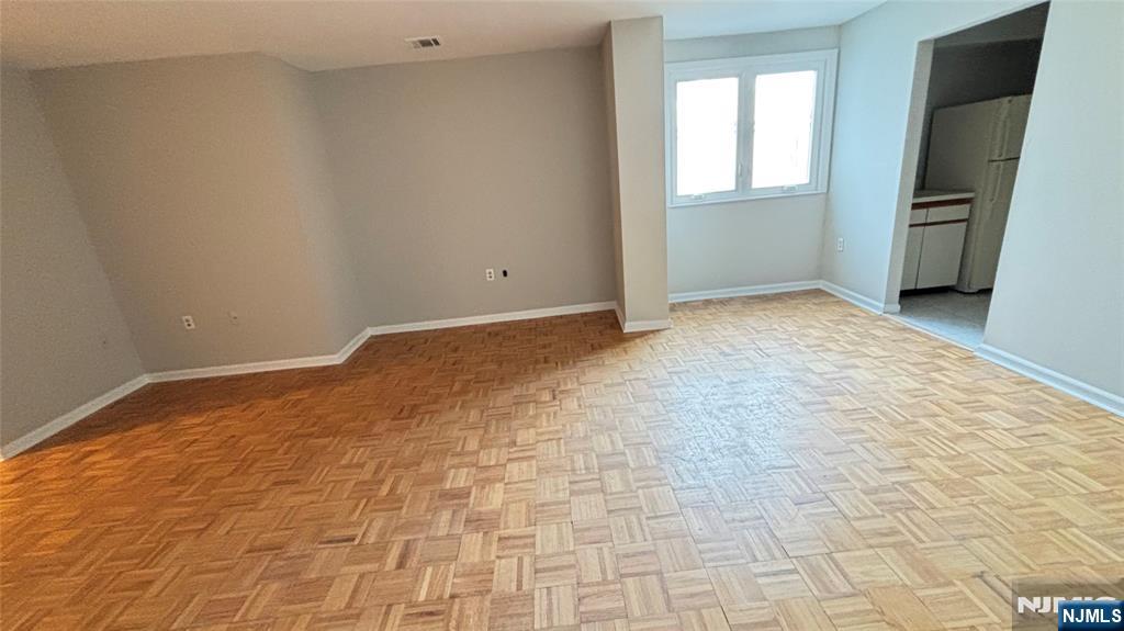 308-310 Passaic Avenue, Unit 201 Harrison, NJ 07029 - Photo 10 of 31 a view of empty room with window