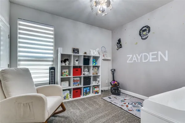 a bed room with a bed and a couch