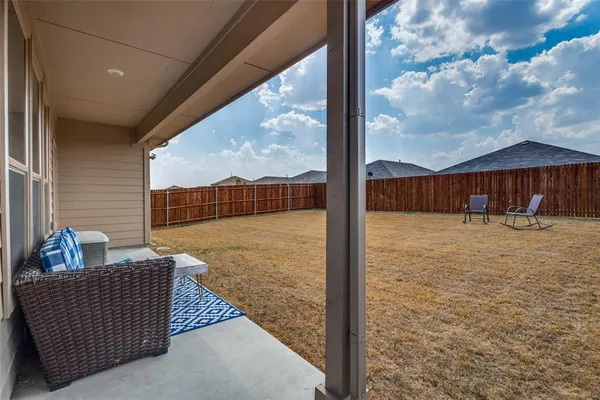 a view of outdoor space with seating area