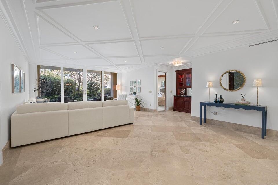 100 Royal Palm Way, Unit D1 Palm Beach, FL 33480 - Photo 18 of 22 a living room with furniture and a large window