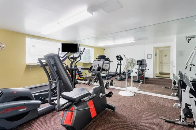 a view of a room with gym equipment